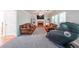 Cozy living room with fireplace, built-in shelving, and comfortable seating at 6221 Woodlore Nw Dr, Acworth, GA 30101