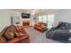 Cozy living room features a fireplace, built-in shelves, and comfortable seating at 6221 Woodlore Nw Dr, Acworth, GA 30101