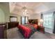 Main bedroom with tray ceilings and plenty of natural light at 6221 Woodlore Nw Dr, Acworth, GA 30101