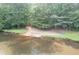 Lakefront access with a boat ramp at 123 Wildwood Dr, Temple, GA 30179