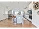 Spacious open kitchen with a center island, stainless steel appliances, and seamless access to a bright dining area at 125 Sidney St, Marietta, GA 30060
