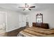View of the main bedroom showing hardwood flooring, ensuite bathroom and closet at 175 Springvalley Way, Stockbridge, GA 30281