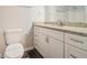 Bathroom featuring granite vanity, white cabinets, a modern sink, and updated fixtures at 4590 Cedar Ridge Trl, Stone Mountain, GA 30083