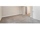 A bedroom with neutral-colored walls and carpet along with a closet with folding doors can be seen in the background at 4590 Cedar Ridge Trl, Stone Mountain, GA 30083