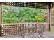 Relax on your private back deck with views of the trees and serene backyard at 5 Northlake Cir # 4 & 5, Peachtree City, GA 30269