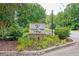 Community sign with flower bed and stone base at 5 Northlake Cir # 4 & 5, Peachtree City, GA 30269