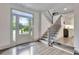 Inviting entryway with natural light, and an eye-catching staircase at 5 Northlake Cir # 4 & 5, Peachtree City, GA 30269