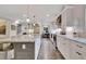 Modern kitchen with granite countertops, stainless steel appliances, and a functional center island with bar stools at 5 Northlake Cir # 4 & 5, Peachtree City, GA 30269