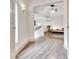 Bright open-plan living area with hardwood floors and natural light at 5 Northlake Cir # 4 & 5, Peachtree City, GA 30269
