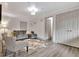 Cozy living area with comfortable seating, white trim, and adjacent laundry room at 5 Northlake Cir # 4 & 5, Peachtree City, GA 30269