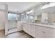 Modern main bathroom offers dual sinks and a glass walk-in shower at 5 Northlake Cir # 4 & 5, Peachtree City, GA 30269