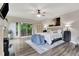 Spacious bedroom with balcony access and a decorative fireplace at 5 Northlake Cir # 4 & 5, Peachtree City, GA 30269