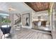 Bright open-concept floor plan with hardwood floors, modern kitchen, and staircase, seamlessly connects living spaces at 5 Northlake Cir # 4 & 5, Peachtree City, GA 30269