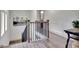 View of the staircase that features wood and metal finishes at 5 Northlake Cir # 4 & 5, Peachtree City, GA 30269