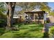 Spacious backyard with a cozy fire pit and a screened-in porch at 3120 Church St, Atlanta, GA 30344