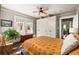 Bedroom featuring a ceiling fan, large closet, and natural lighting at 3120 Church St, Atlanta, GA 30344