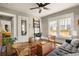 This living room has hardwood floors, large windows and stylish furnishings at 3120 Church St, Atlanta, GA 30344