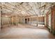 Large unfinished basement with exposed rafters, concrete walls, and concrete floor, ready for new design at 510 Towneside Ln, Marietta, GA 30064