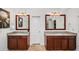Double vanity bathroom with granite counters, modern fixtures, and tiled floors at 510 Towneside Ln, Marietta, GA 30064