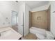 Bright bathroom features tile flooring, a bathtub with a shower, and a modern vanity with a sink at 510 Towneside Ln, Marietta, GA 30064