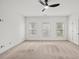 Spacious bedroom with three windows, carpet and white walls at 510 Towneside Ln, Marietta, GA 30064