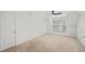 Spacious bedroom with a door, window and neutral carpet at 510 Towneside Ln, Marietta, GA 30064