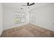 Bright bedroom with a window and ceiling fan, offering comfortable living space at 510 Towneside Ln, Marietta, GA 30064