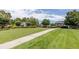 Beautiful lawn with sidewalk leading to a community gazebo, complemented by well-manicured landscaping at 510 Towneside Ln, Marietta, GA 30064