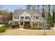 Charming two-story home featuring manicured landscaping and a welcoming front porch at 510 Towneside Ln, Marietta, GA 30064