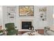 Cozy living room with a fireplace, built-in shelves, and comfortable seating, perfect for relaxation at 510 Towneside Ln, Marietta, GA 30064