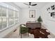This office features a modern ceiling fan, a desk, a window, and natural light at 510 Towneside Ln, Marietta, GA 30064
