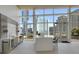 Modern kitchen with stainless steel appliances, a spacious island, and stunning city views at 3325 Piedmont Ne Rd # 2104, Atlanta, GA 30305