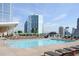 Rooftop pool with lounge chairs and city views, perfect for relaxation and enjoying the urban landscape at 3325 Piedmont Ne Rd # 2104, Atlanta, GA 30305