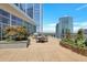 Rooftop terrace with a grill, dining space and lush landscaping at 3325 Piedmont Ne Rd # 2104, Atlanta, GA 30305