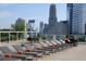 Relaxing rooftop terrace with plenty of lounge seating overlooking the city at 3325 Piedmont Ne Rd # 2104, Atlanta, GA 30305