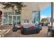 Stylish rooftop terrace with comfortable lounge seating, a fireplace, and city views at 3325 Piedmont Ne Rd # 2104, Atlanta, GA 30305