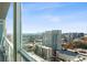 Expansive city views from the balcony of this modern high rise apartment at 3325 Piedmont Ne Rd # 2104, Atlanta, GA 30305