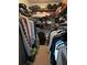 Walk-in closet with ample storage, featuring shelving and hanging space for an organized wardrobe at 5167 Manitu Sw Ct, Lilburn, GA 30047