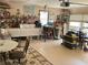 Organized garage space with a workbench, tools, storage containers, and a garage door at 5167 Manitu Sw Ct, Lilburn, GA 30047