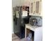 Kitchen features a black refrigerator and a beverage station on the countertop at 5167 Manitu Sw Ct, Lilburn, GA 30047