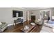 Spacious living room with hardwood floors and lots of seating at 727 Channing Nw Dr, Atlanta, GA 30318