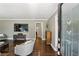 Inviting living room featuring hardwood floors, neutral walls, and a large window offering a bright space at 727 Channing Nw Dr, Atlanta, GA 30318