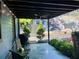 Outdoor patio area with comfortable seating, string lights, and outdoor grill with garden at 727 Channing Nw Dr, Atlanta, GA 30318