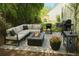 Cozy backyard with outdoor seating and a fire pit, perfect for entertaining guests at 1715 Crestwell Ln, Grayson, GA 30017