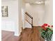 View of the Entryway featuring wood floors and staircase with white banister at 1715 Crestwell Ln, Grayson, GA 30017