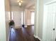 View of the Entryway featuring wood floors and access to other living spaces at 1715 Crestwell Ln, Grayson, GA 30017