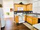 Well-lit kitchen with ample counter space, updated appliances, and stylish backsplash at 1715 Crestwell Ln, Grayson, GA 30017