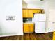 Bright kitchen with plenty of cabinet and counter space, including a white refrigerator at 1715 Crestwell Ln, Grayson, GA 30017