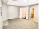 Expansive main bedroom features a tray ceiling, soft carpet, and access to a walk-in closet at 1715 Crestwell Ln, Grayson, GA 30017
