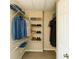 Organized walk-in closet with shelving and hanging space, providing ample storage for clothes and accessories at 1715 Crestwell Ln, Grayson, GA 30017